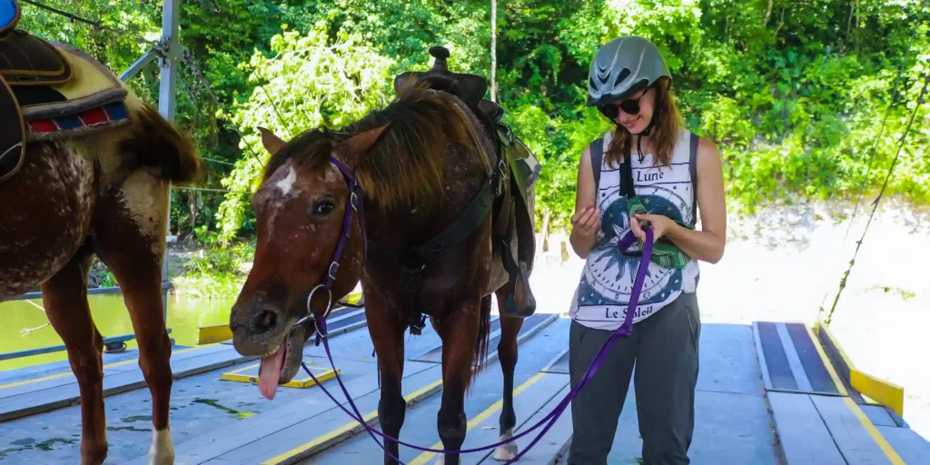 Guests at Xunantunich with El Castillo during a guided horseback tour from San Ignacio, Belize