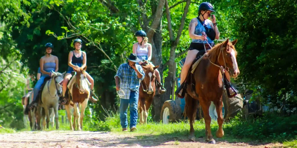 Horseback rider at San Lorenzo Farm near San Ignacio, Belize